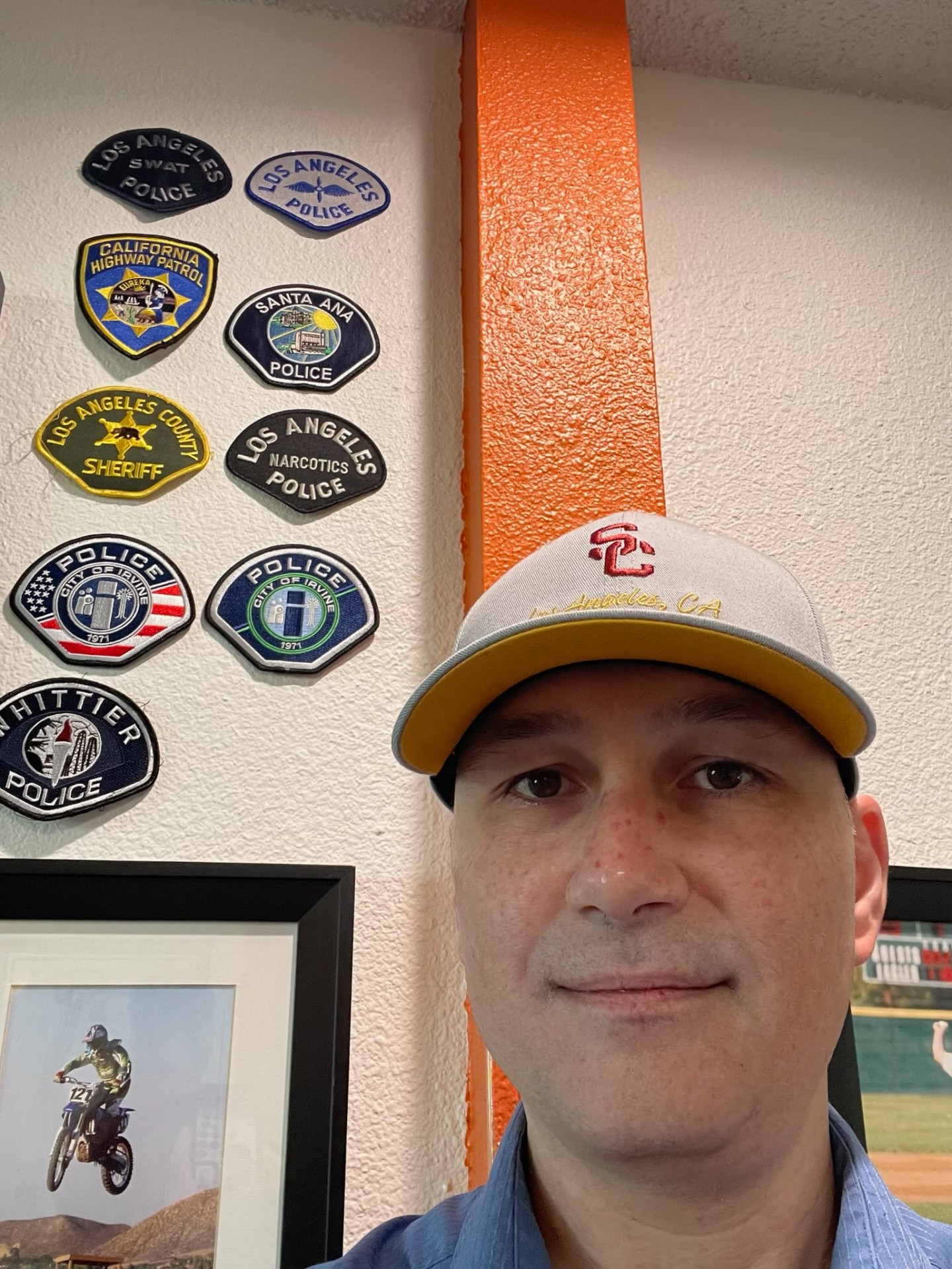 Wall of first-responder patches at the clinic