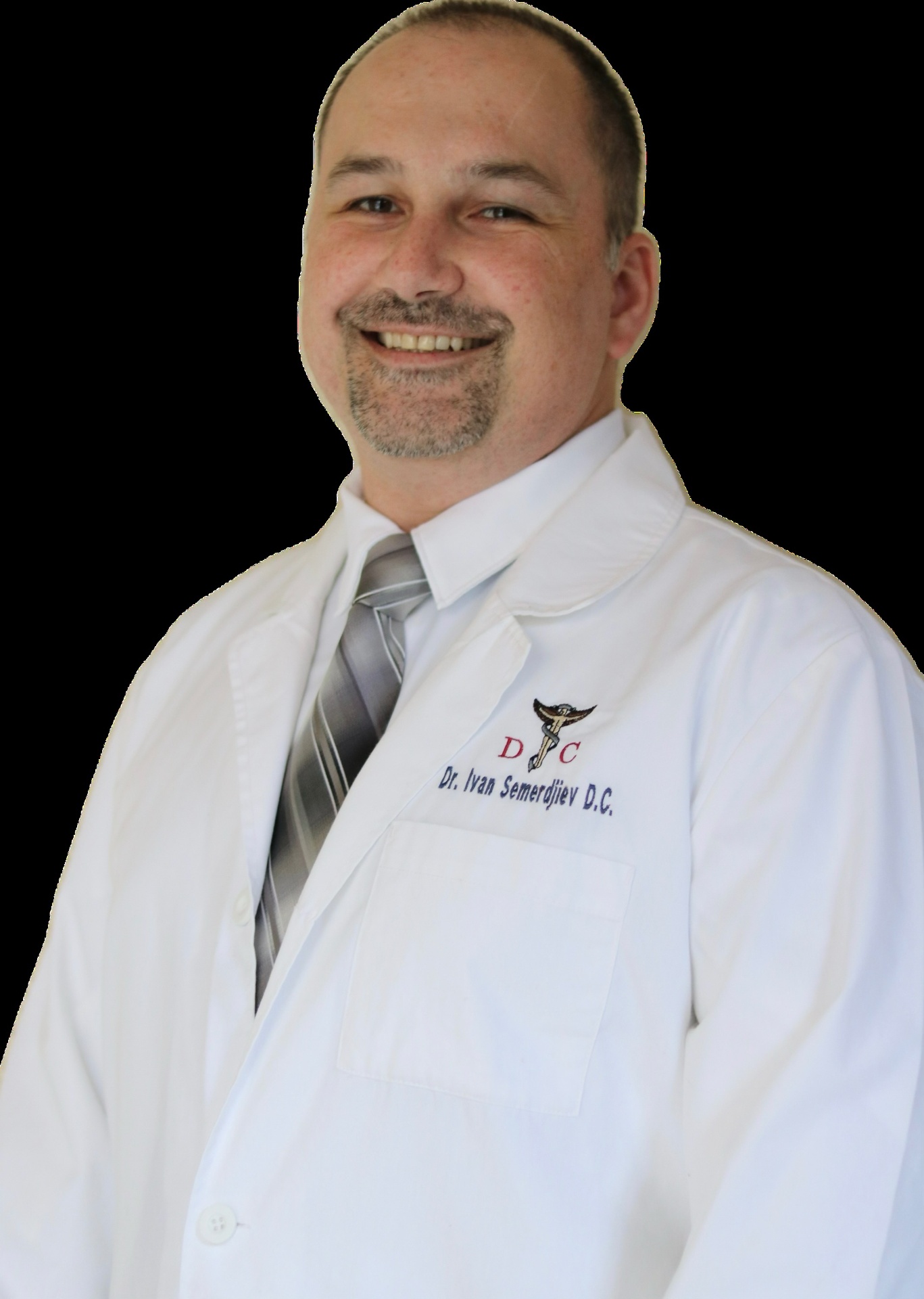 Dr. Ivan Semerdjiev, DC in his clinic coat